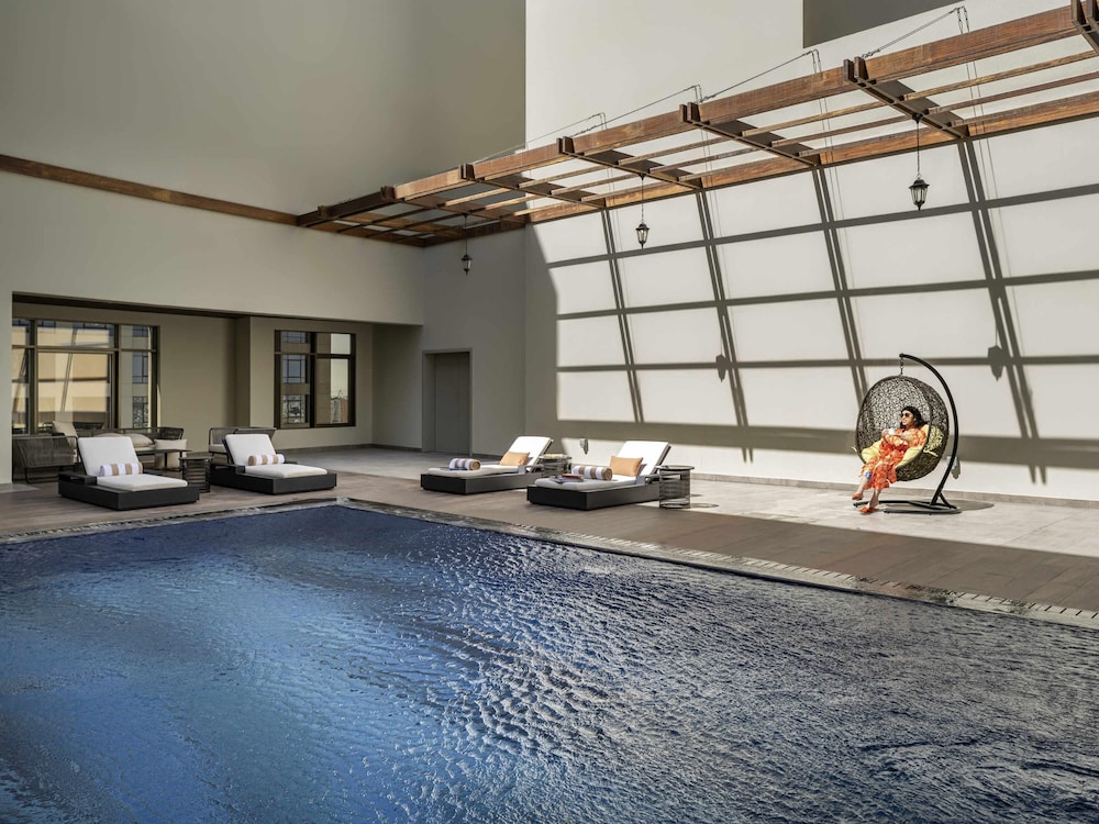 Suite Royal, varias camas del hotel Mövenpick and Residences Riyadh