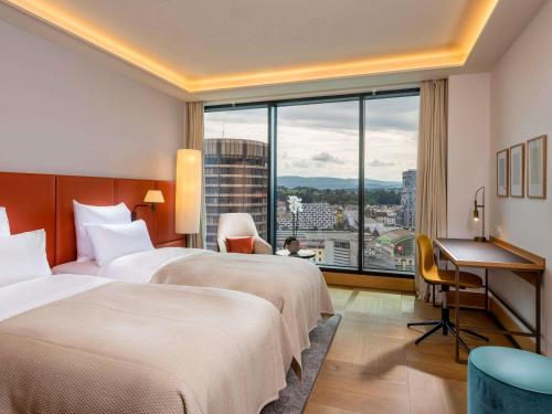 Habitación Doble Deluxe - 2 camas del hotel Mövenpick Hotel Basel