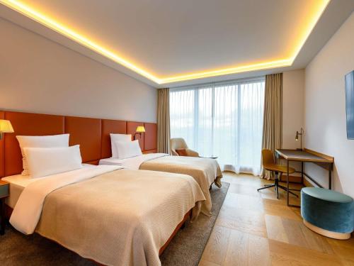 Habitación Doble Clásica - 2 camas del hotel Mövenpick Hotel Basel. Foto 1