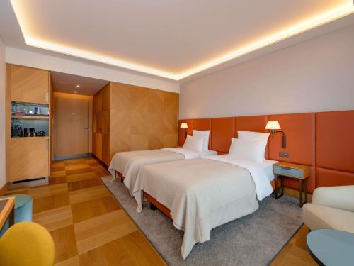 Habitación Doble Clásica - 2 camas del hotel Mövenpick Hotel Basel. Foto 4