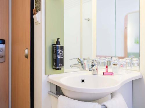 Habitación Triple del hotel ibis budget Zurich City West