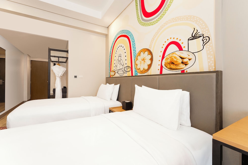 Habitación estándar con dos camas individuales del hotel Mercure Mactan Cebu. Foto 1