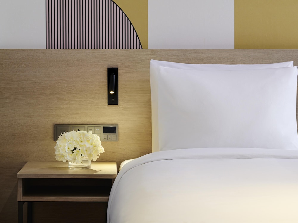 Habitación Superior con 1 cama doble y 1 cama individual del hotel ibis Styles Ambassador Incheon Airport T2. Foto 2