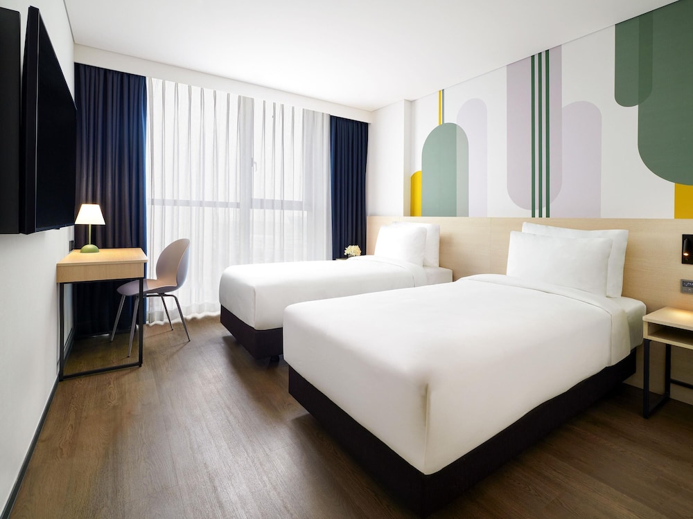 Habitación superior con 2 camas individuales del hotel ibis Styles Ambassador Incheon Airport T2. Foto 4