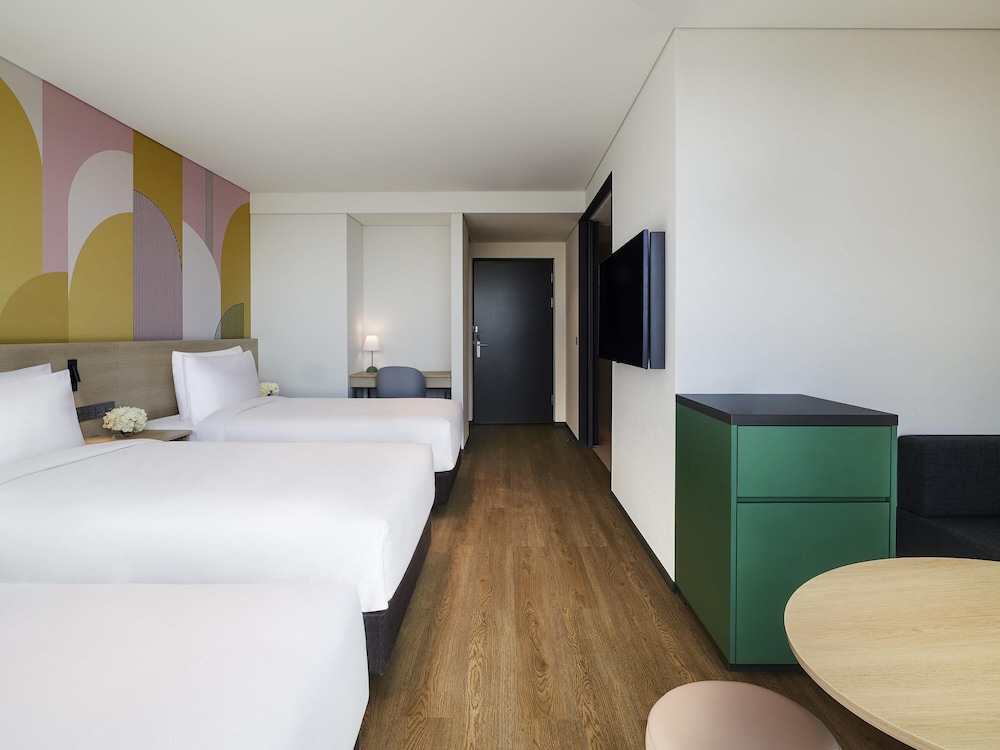 Suite Superior con 3 camas individuales del hotel ibis Styles Ambassador Incheon Airport T2. Foto 4