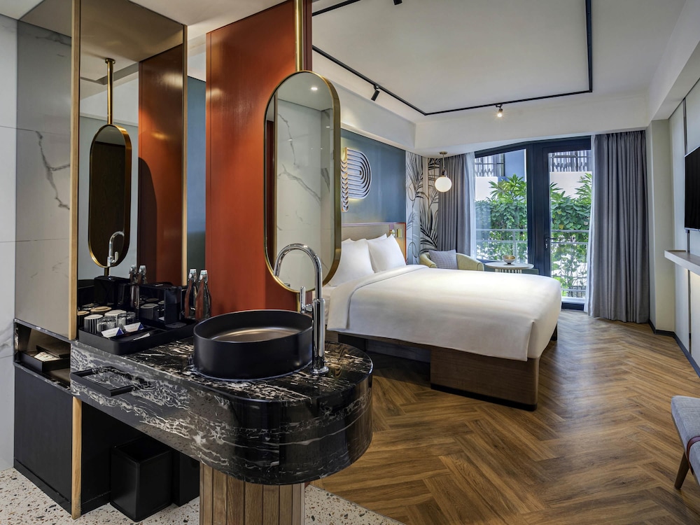 Habitación Confort, 1 cama de matrimonio grande (XL) del hotel Tribe Bali Kuta Beach. Foto 8