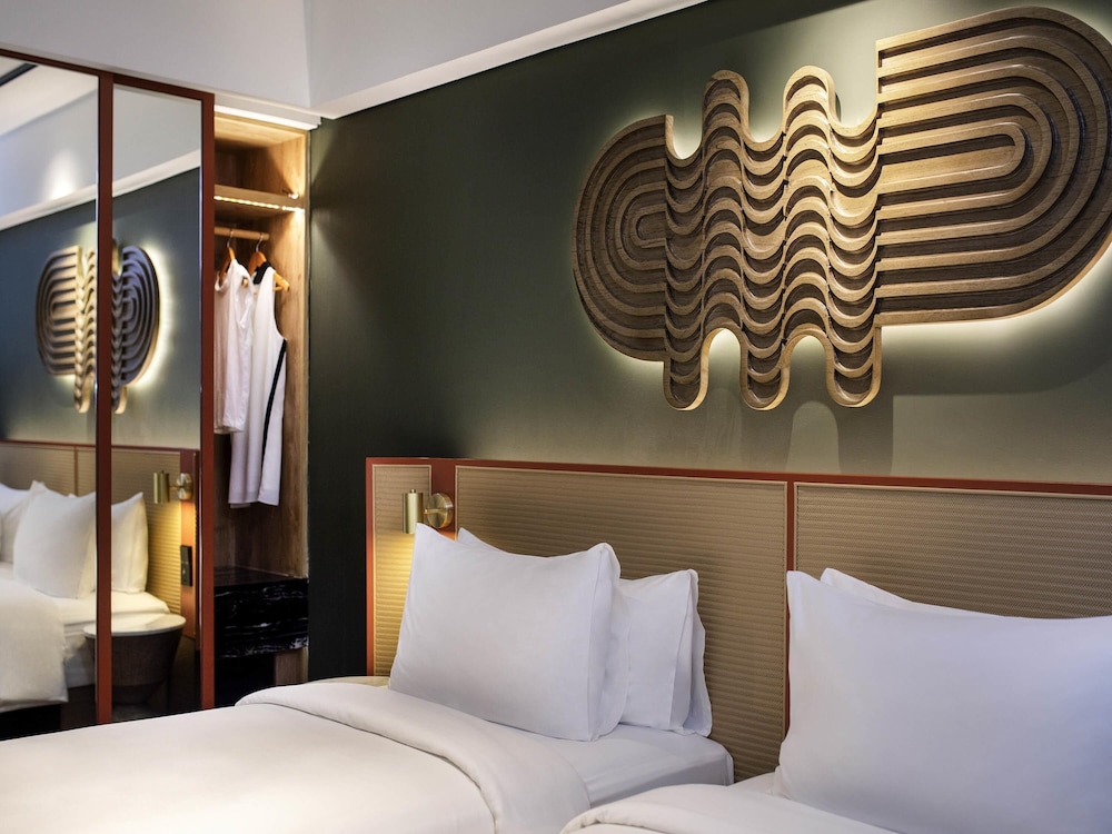 Habitación Confort, 2 camas individuales, balcón del hotel Tribe Bali Kuta Beach. Foto 8