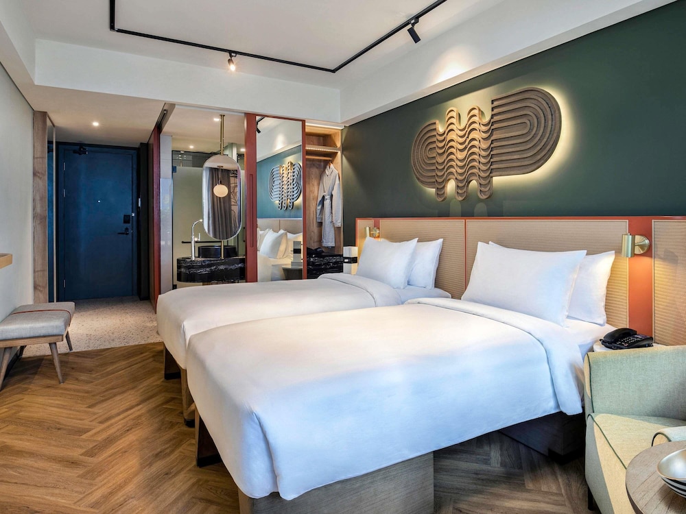 Habitación Confort, 2 camas individuales, balcón del hotel Tribe Bali Kuta Beach. Foto 10