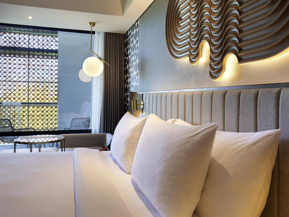 Suite Confort, 1 cama de matrimonio grande, vistas al mar (TRIBE) del hotel Tribe Bali Kuta Beach. Foto 8