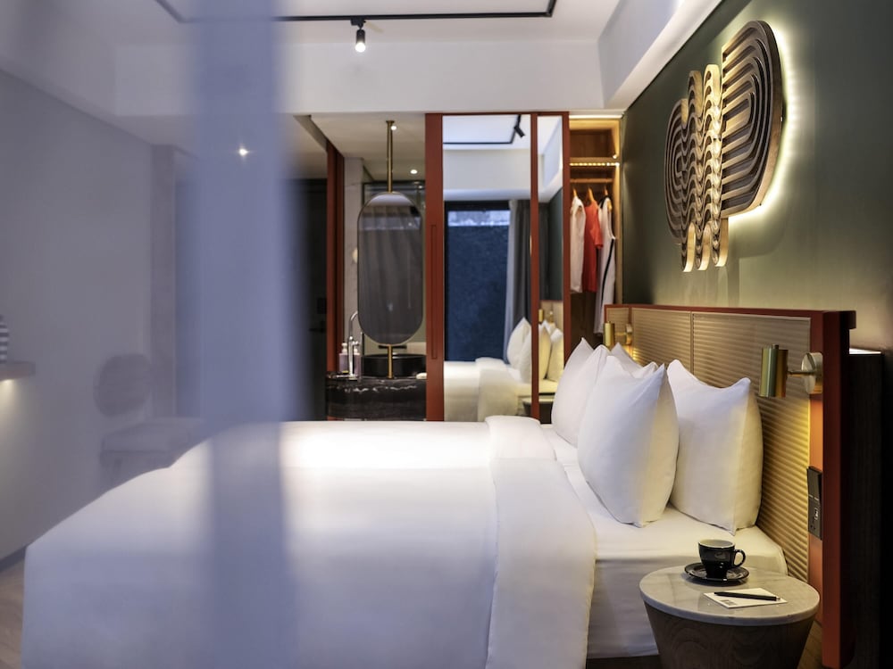 Habitación Confort, 2 camas individuales del hotel Tribe Bali Kuta Beach. Foto 5