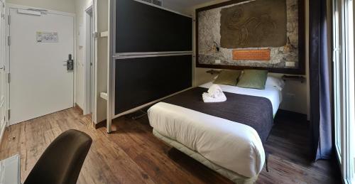 Habitación cuádruple del hotel El Indio Chocolatería Boutique. Foto 1