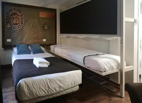 Habitación cuádruple del hotel El Indio Chocolatería Boutique. Foto 6