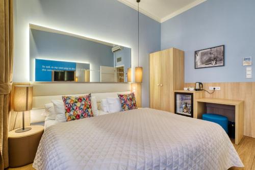 Double or Twin Room with Garden or Patio View del hotel Salvator Boutique. Foto 1