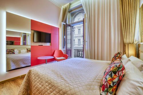 Habitación Doble Confort con balcón del hotel Salvator Boutique. Foto 1