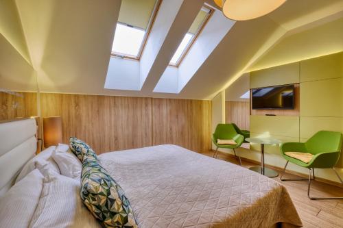 Habitación Doble en el ático del hotel Salvator Boutique. Foto 1