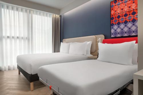 Habitación estándar con cama grande y sofá cama individual - Desayuno gratuito del hotel Holiday Inn Express Porto Boavista, an IHG Hotel. Foto 4