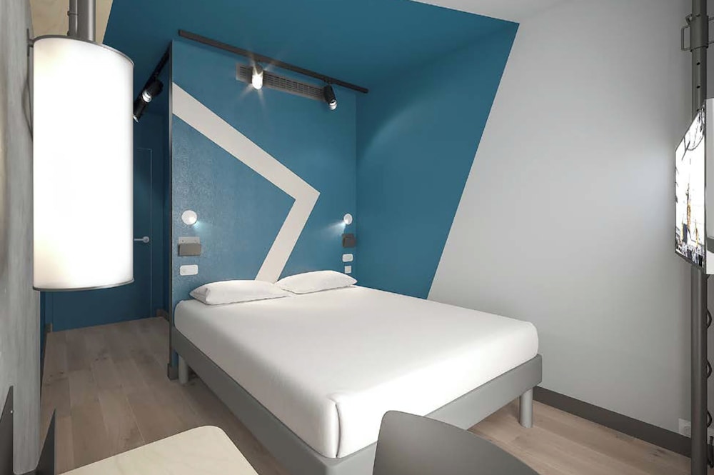 Habitación estándar con 2 camas individuales del hotel Ibis Budget Nantes Nord Treillières. Foto 3