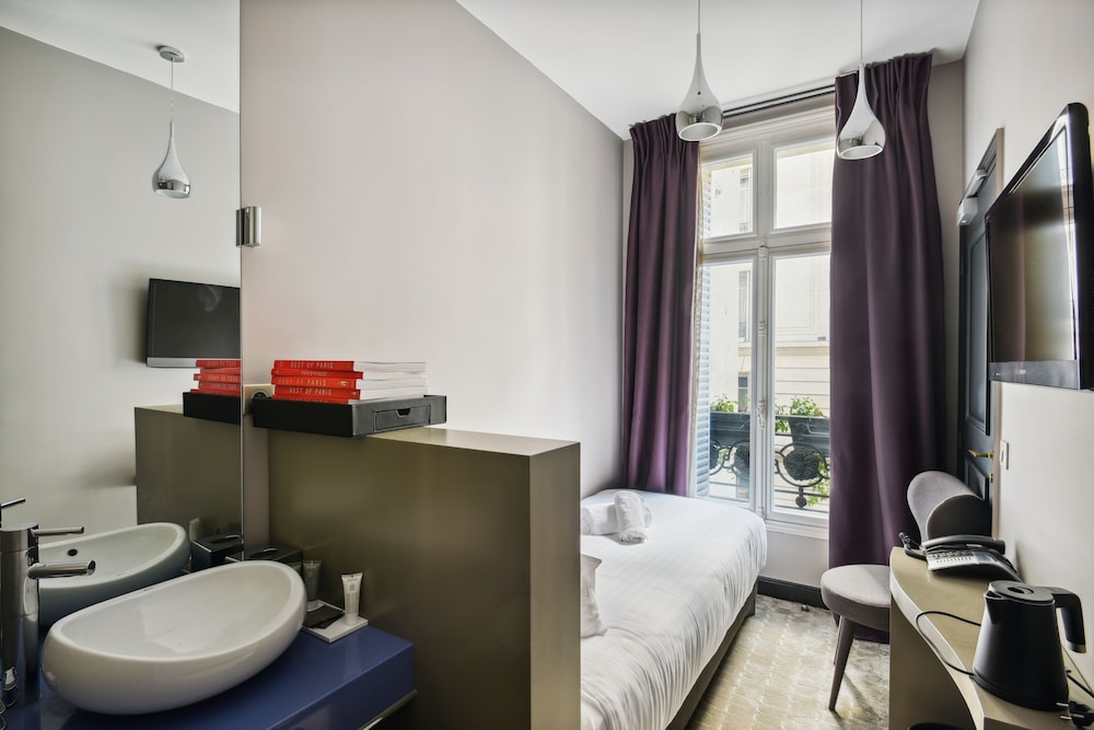 Suite familiar del hotel Le Paris Singulier. Foto 1