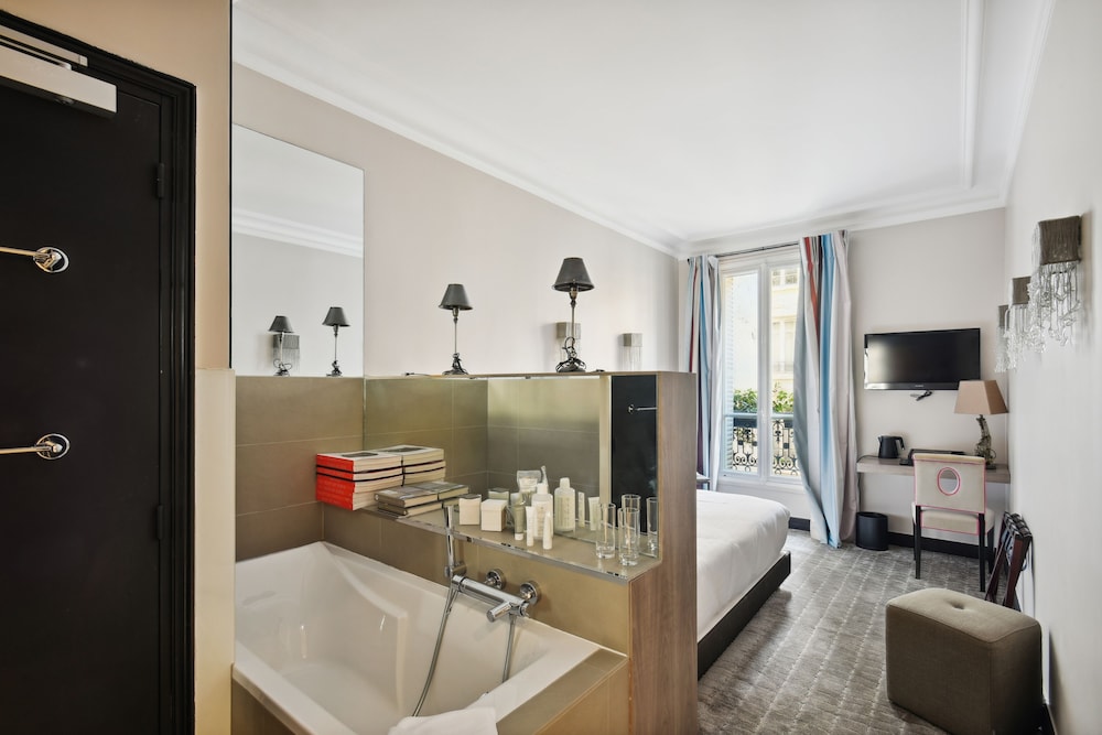 Habitación clásica del hotel Le Paris Singulier. Foto 1