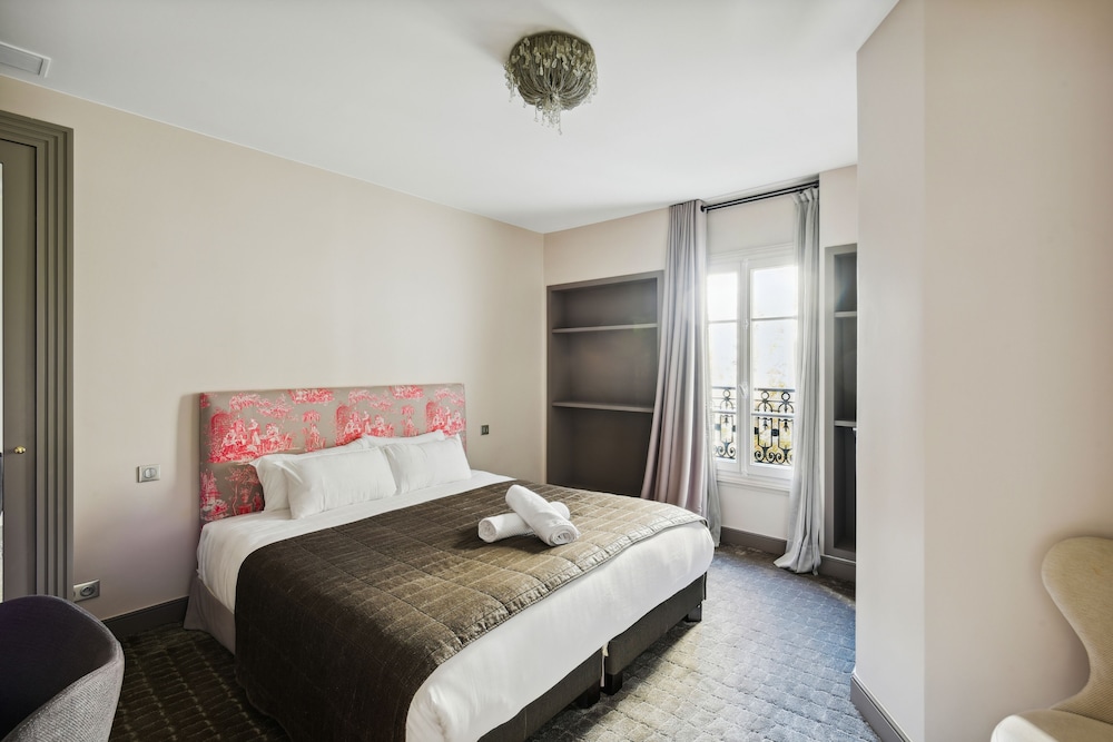 Habitación superior del hotel Le Paris Singulier