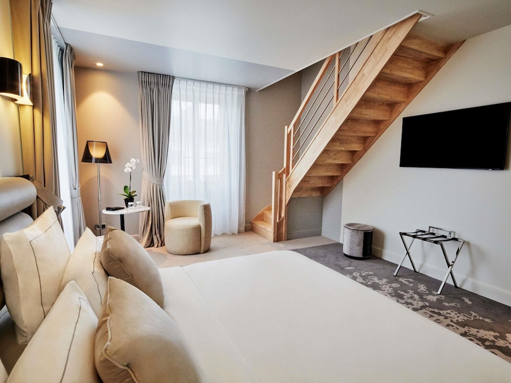 Dúplex, 1 cama de matrimonio grande con sofá cama (Suite) del hotel La Licorne and Spa Troyes MGallery. Foto 2
