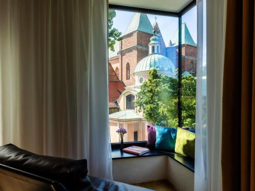 Habitación Deluxe con cama extragrande del hotel The Bridge Wroclaw - MGallery