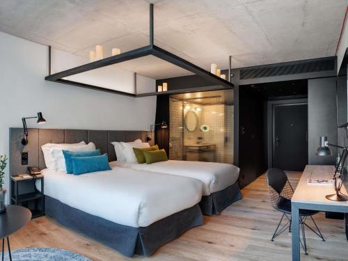 Habitación Doble Clásica - 2 camas del hotel The Bridge Wroclaw - MGallery. Foto 2