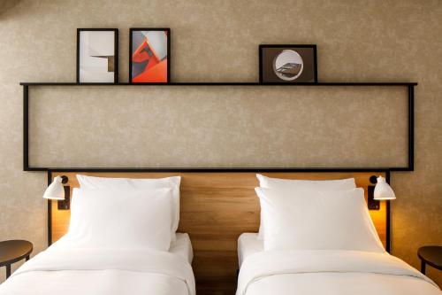 Habitación Twin Accesible del hotel ibis London Sutton Point. Foto 7
