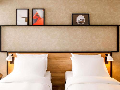 Habitación Doble Estándar - 2 camas del hotel ibis London Sutton Point. Foto 1