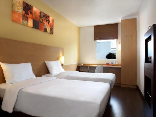 Habitación Doble Estándar - 2 camas del hotel Ibis Pattaya. Foto 3