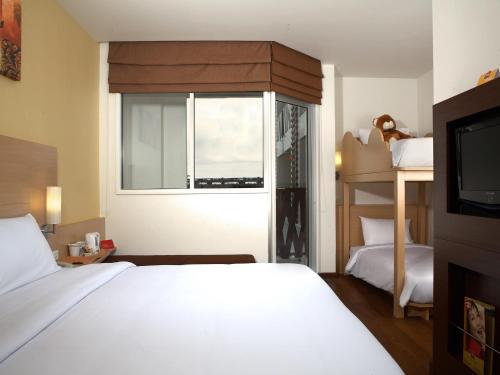 Habitación Familiar del hotel Ibis Pattaya. Foto 1