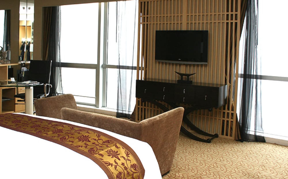 HABITACIÓN DE LUJO CLUB SOFITEL, Una Cama King - Size, Vistas al Lago del hotel Sofitel Nanjing Galaxy Suning. Foto 4