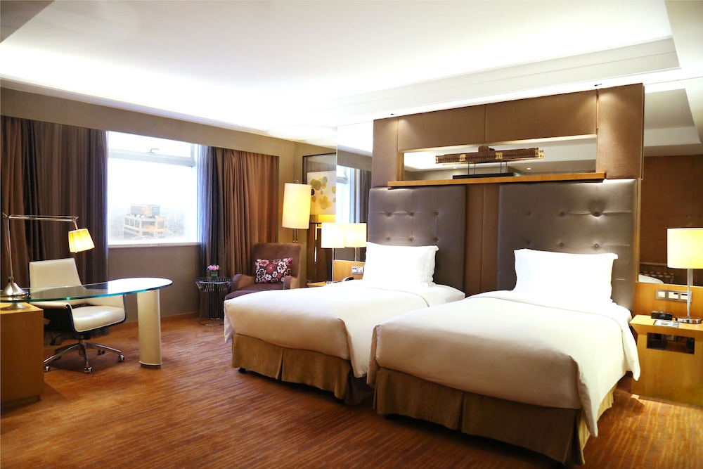HABITACIÓN DE LUJO CLUB SOFITEL, 2 Camas Individuales, Vistas a la Ciudad del hotel Sofitel Nanjing Galaxy Suning. Foto 2