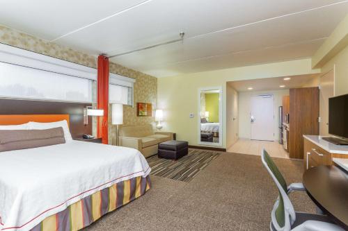 Estudio con cama grande - Adaptada para personas con movilidad reducida o con discapacidad auditiva del hotel Home2 Suites By Hilton Albany Wolf Rd. Foto 1