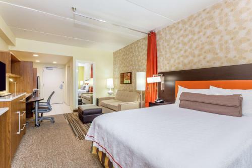Suite Estudio con cama grande - Adaptada para personas con discapacidad auditiva - No fumadores del hotel Home2 Suites By Hilton Albany Wolf Rd. Foto 4
