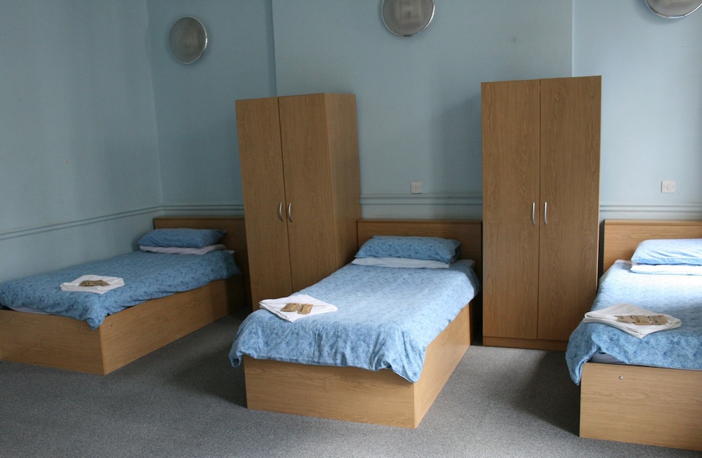 Habitación triple básica, 3 camas individuales, baño compartido del hotel Lse Passfield Hall - Campus Accommodation. Foto 2