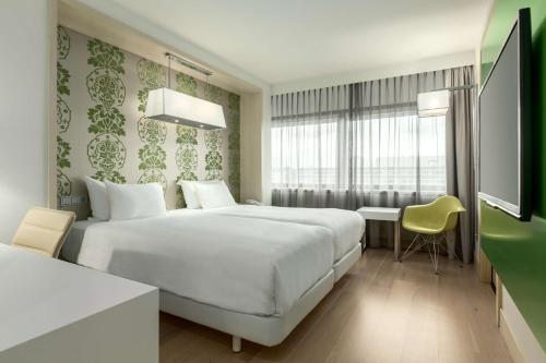 Habitaciones Familiares comunicadas del hotel NH Amsterdam Zuid. Foto 1