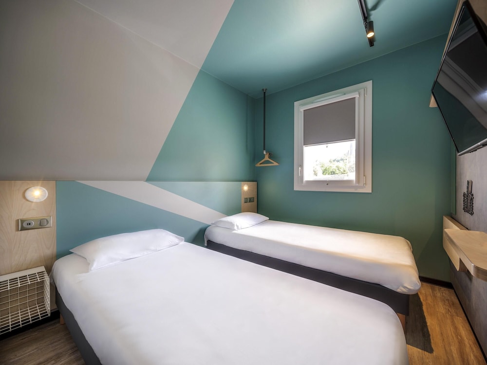 Habitación estándar con 2 camas individuales del hotel Ibis Budget Forbach Centre. Foto 1