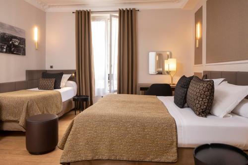 Habitación Triple del hotel Hôtel Du Levant. Foto 4