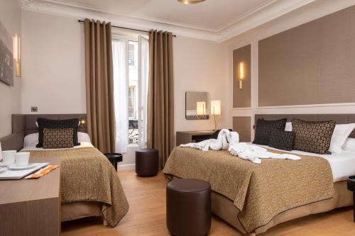 Habitación Triple del hotel Hôtel Du Levant. Foto 5
