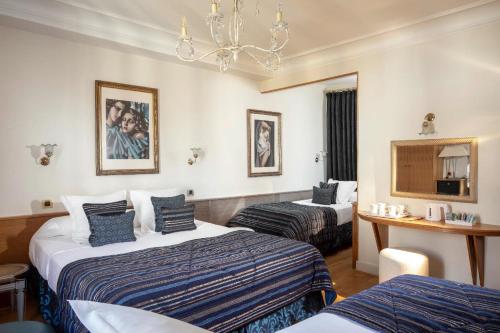 Habitación cuádruple del hotel Hôtel Du Levant