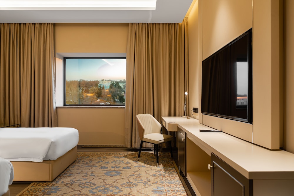 Habitación estándar, 2 camas individuales del hotel Mövenpick Samarkand. Foto 3