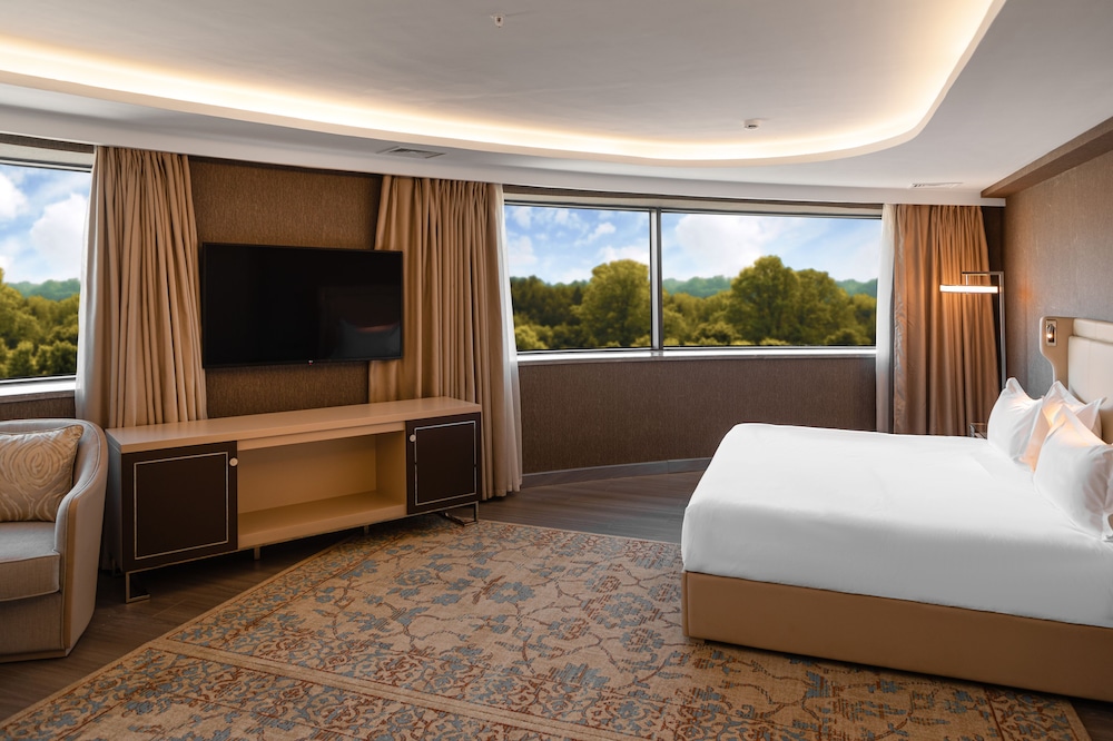 Apartamento, 2 camas dobles (1 Double and 2 Single beds) del hotel Mövenpick Samarkand. Foto 1