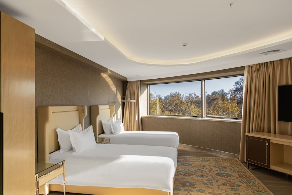 Apartamento, 2 camas dobles (1 Double and 2 Single beds) del hotel Mövenpick Samarkand. Foto 3