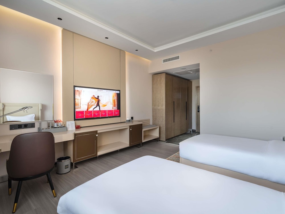 Habitación estándar, 2 camas individuales del hotel Mövenpick Samarkand. Foto 7