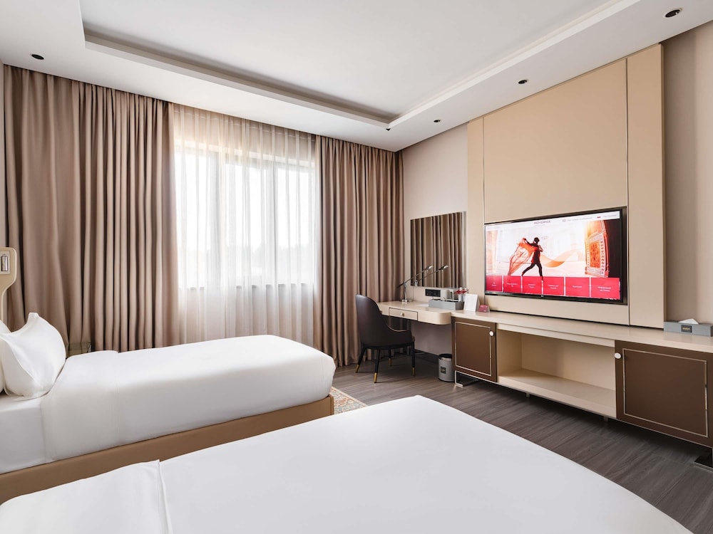 Habitación estándar, 2 camas individuales del hotel Mövenpick Samarkand. Foto 9
