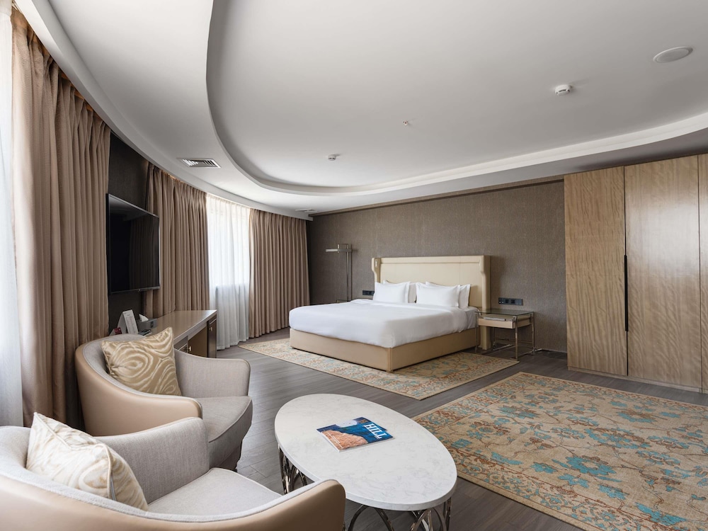 Apartamento, 2 camas dobles (1 Double and 2 Single beds) del hotel Mövenpick Samarkand. Foto 8