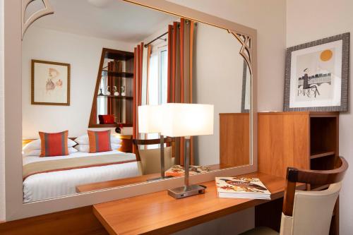 Habitación Doble Clásica del hotel Grand Hotel Des Balcons. Foto 2