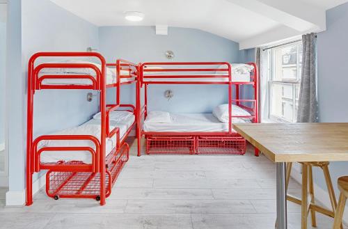 Bed in 8 - Bed Female Dormitory Room Ensuite (18–40 years) del hotel Astor Kensington. Foto 1