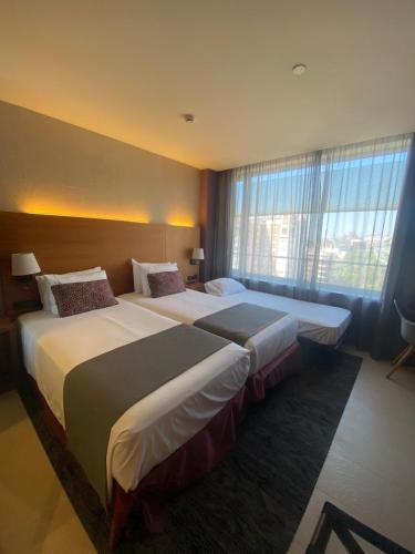 Habitación Doble con cama supletoria - 1 o 2 camas del hotel Badalona Tower. Foto 5